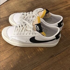 Women’s Nike White and Black Low-Top Sneakers